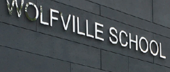Photo of the Wolfville School Sign on the school.