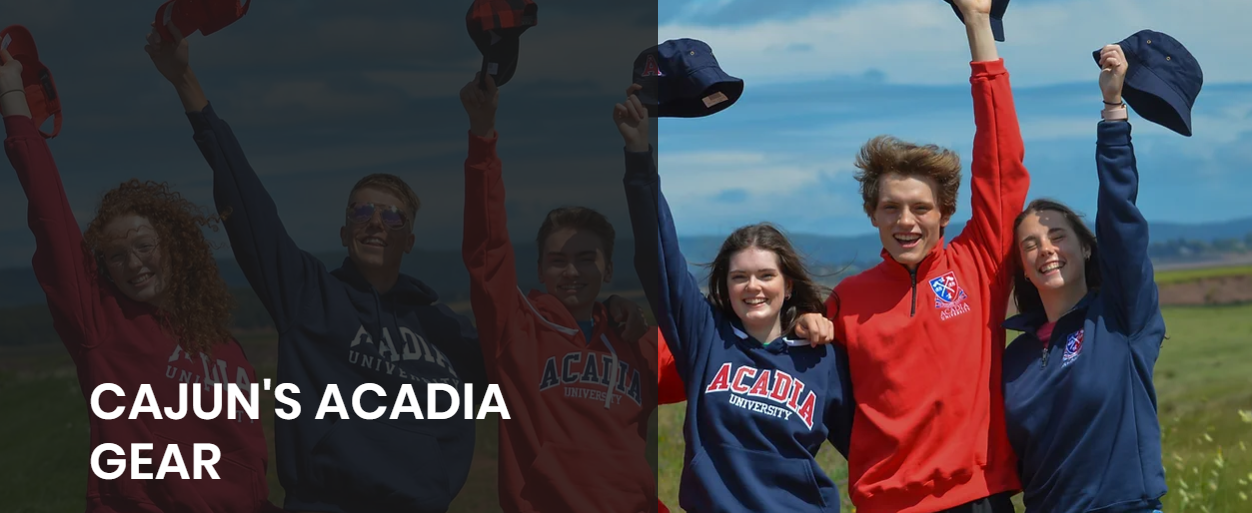 A group of students wearing school branded clothing holding their hats in the air.