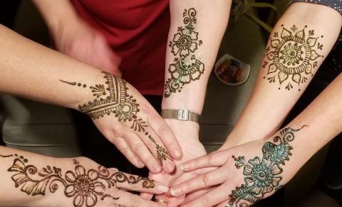 arms showing henna temporary tattoos