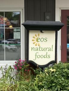 Eos Natural Food Store sign