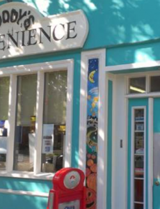 Photo of the outside of the Muddy's Convenience building.