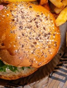 A photo of a burger from The Axe Bar & Grill