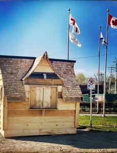 The new temporary visitor information centre at Waterfront Park with flags in the background